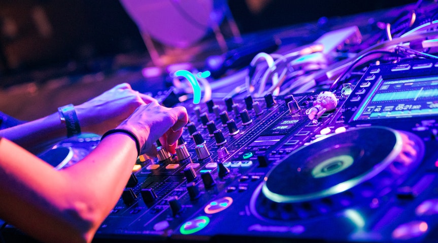 Create a virtual festival or live streaming event with multiple DJs or artists